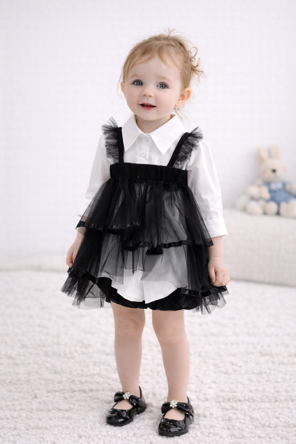 Blusa bianca con corpetto in tulle nero   Eleganza e stile per bambine