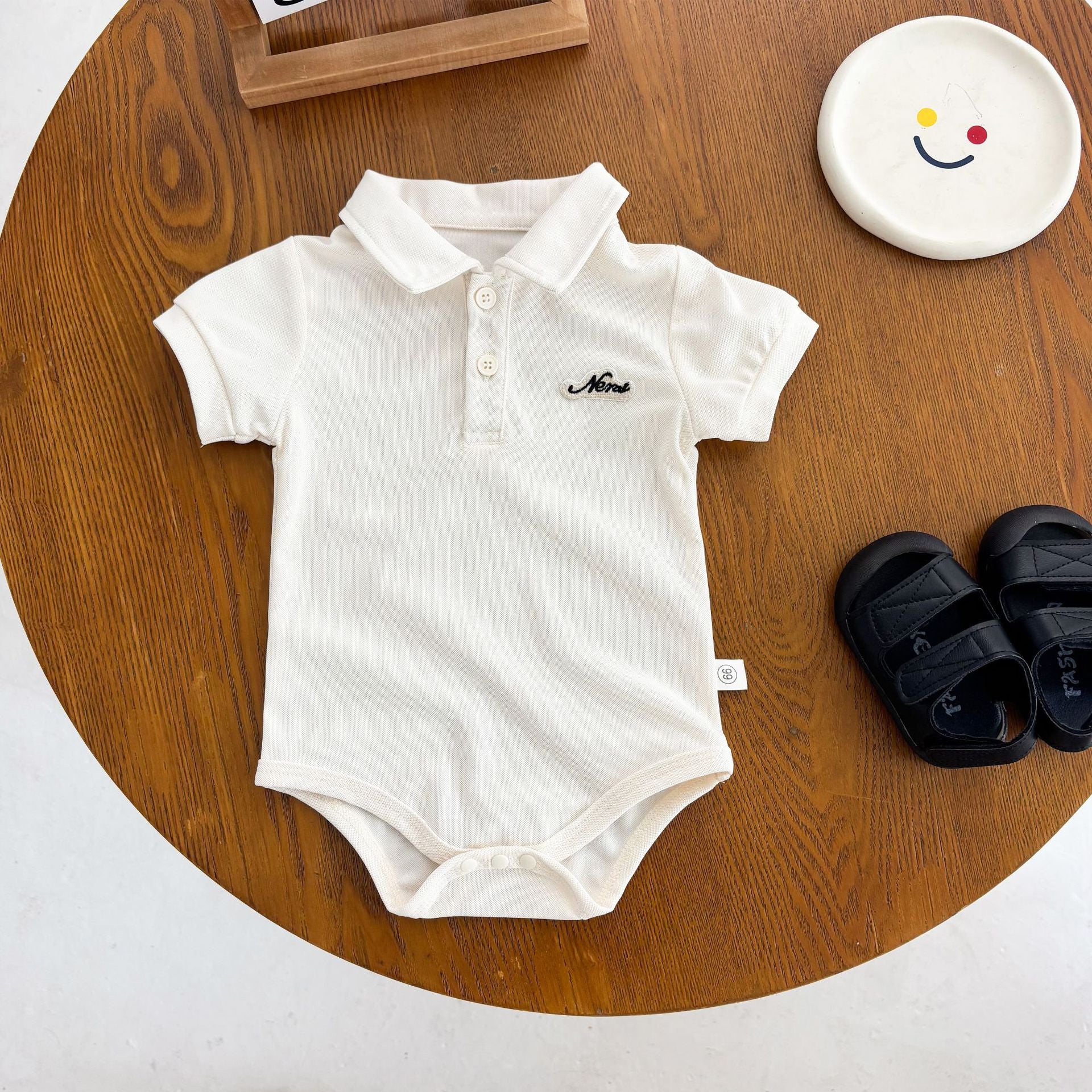 Body polo estivo unisex color panna con bottoncini