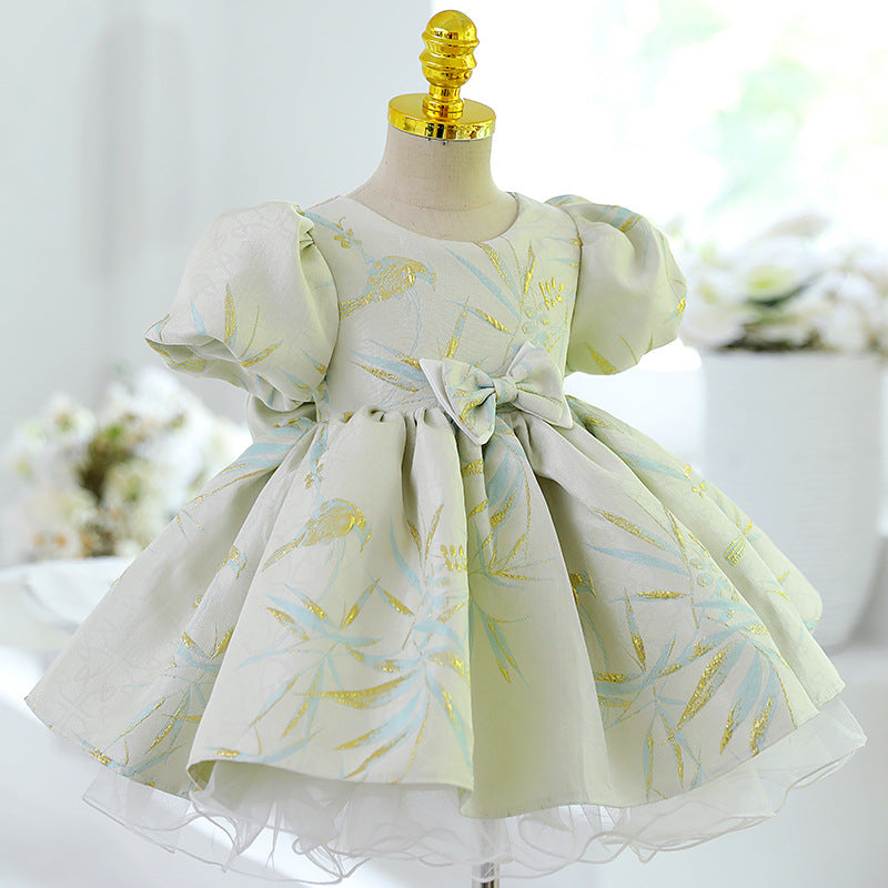 Abito cerimonia bambina elegante con maniche a sbuffo e fiocco