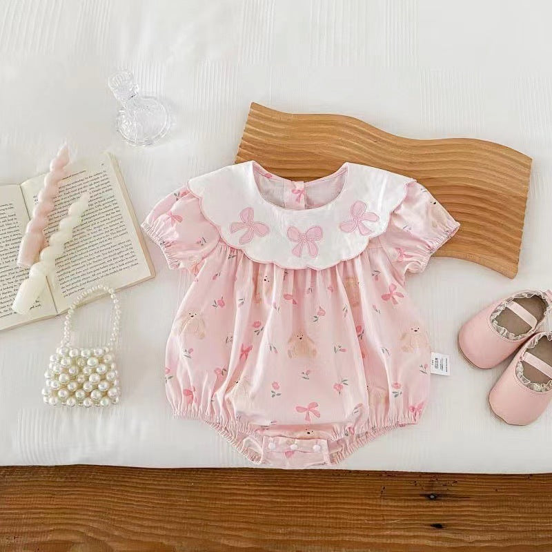 Tutina rosa con colletto bianco ricamato e stampa orsacchiotti