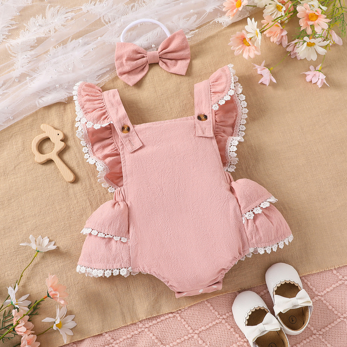 Pagliaccetto e fiocchetto elegante rosa con balze
