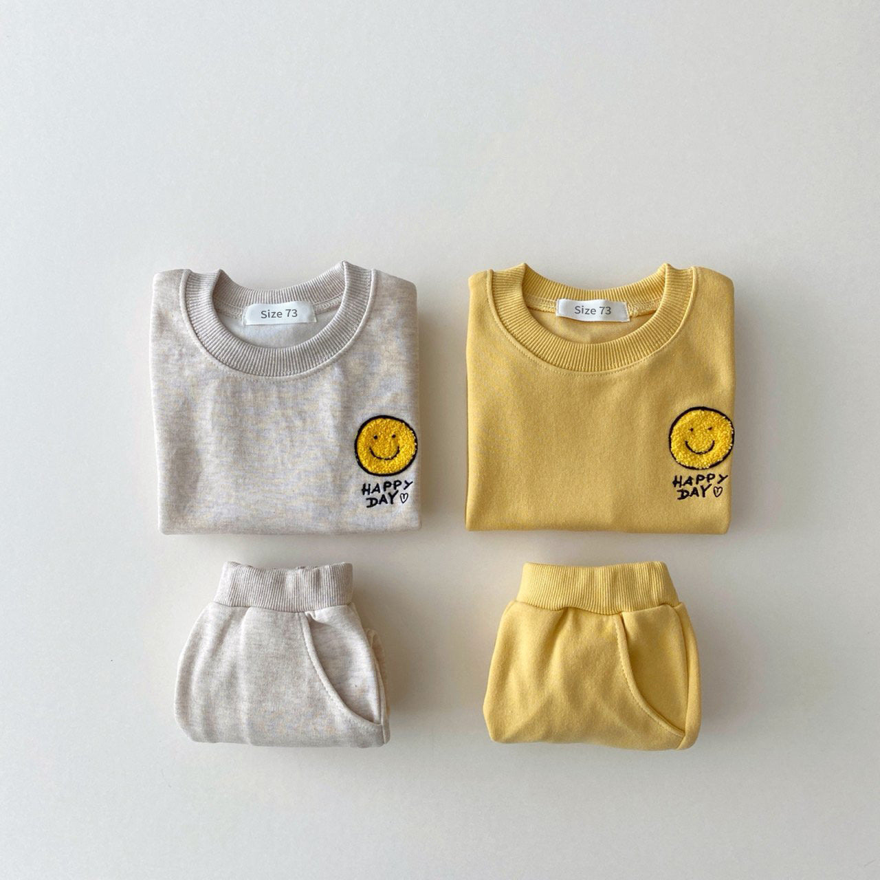 Tuta  Felpata Bambino “Happy Day”  2 Pezzi: Felpa + Pantaloni