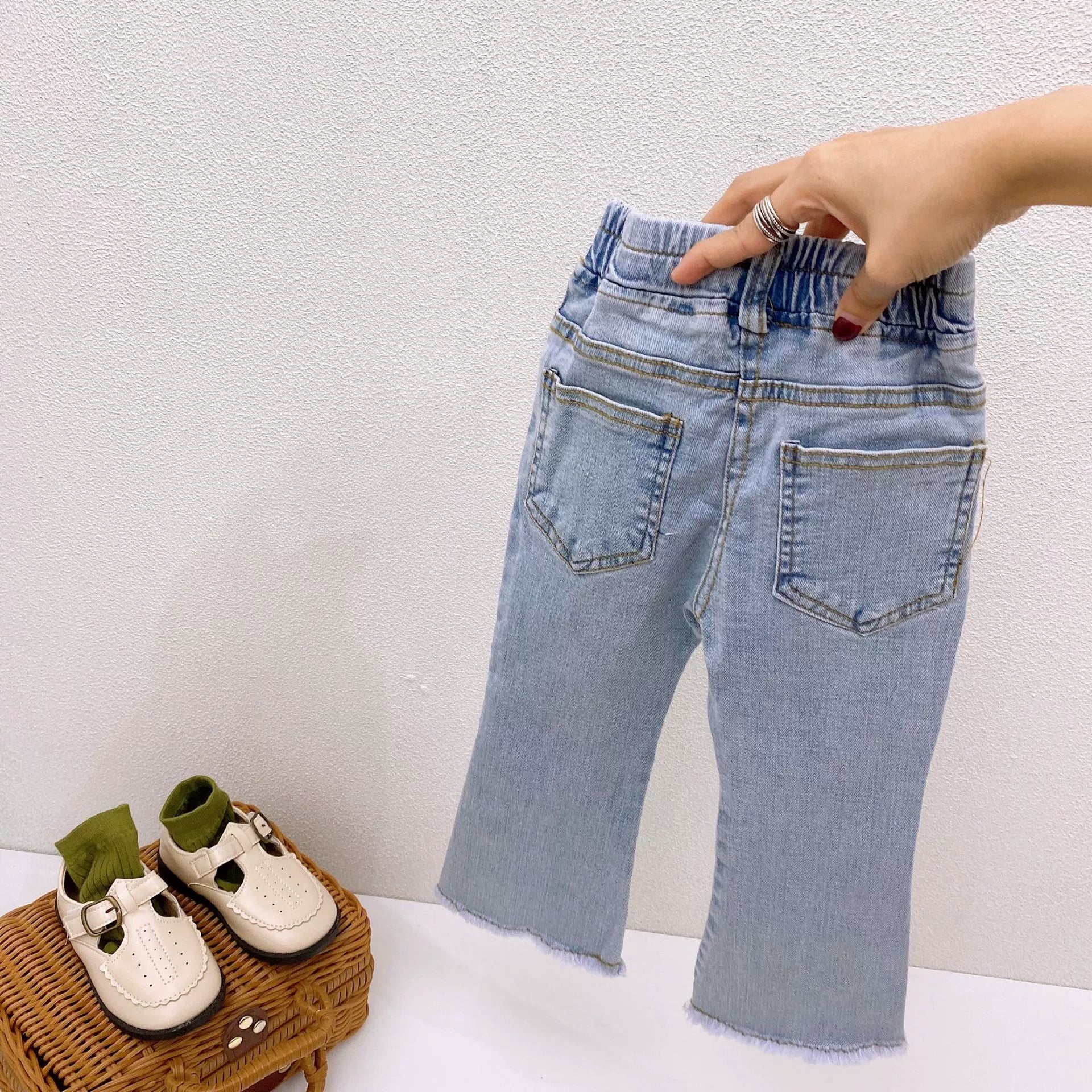 Jeans a zampa con bottoni Bimba