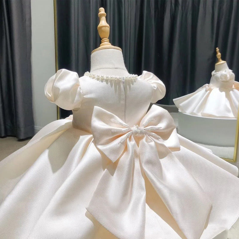 Abito cerimonia bambina  Bianco perla con fiocco e dettagli in perle