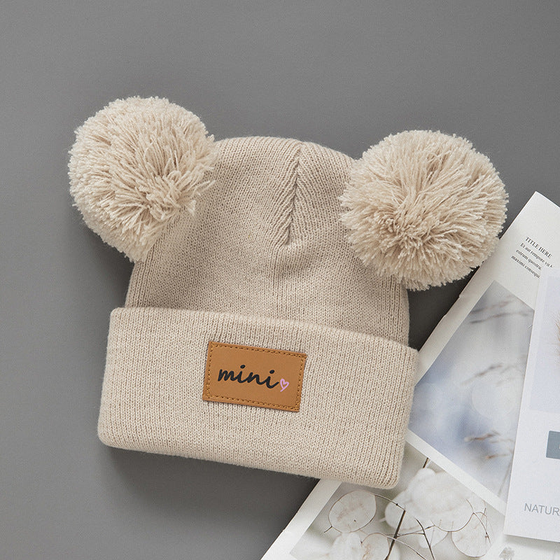 Cappellino in maglia “Mini” con doppio pompon – Invernale, caldo e morbido