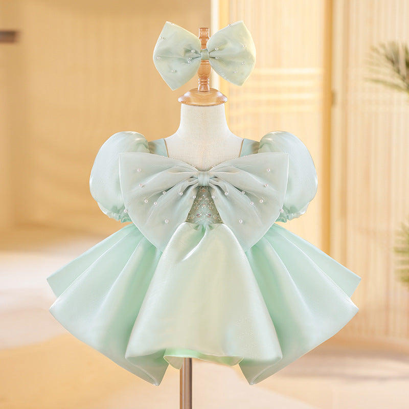 Abito cerimonia bambina   Verde menta con maxi fiocco e perle