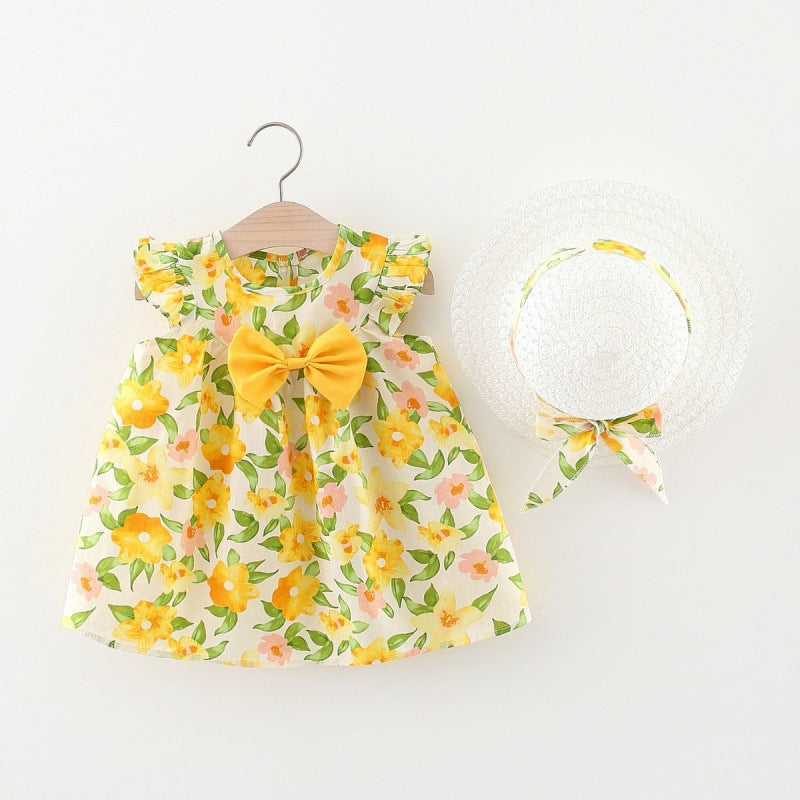 Vestitino Floreale Giallo con Cappellino Coordinato – Edizione Sole d’Estate