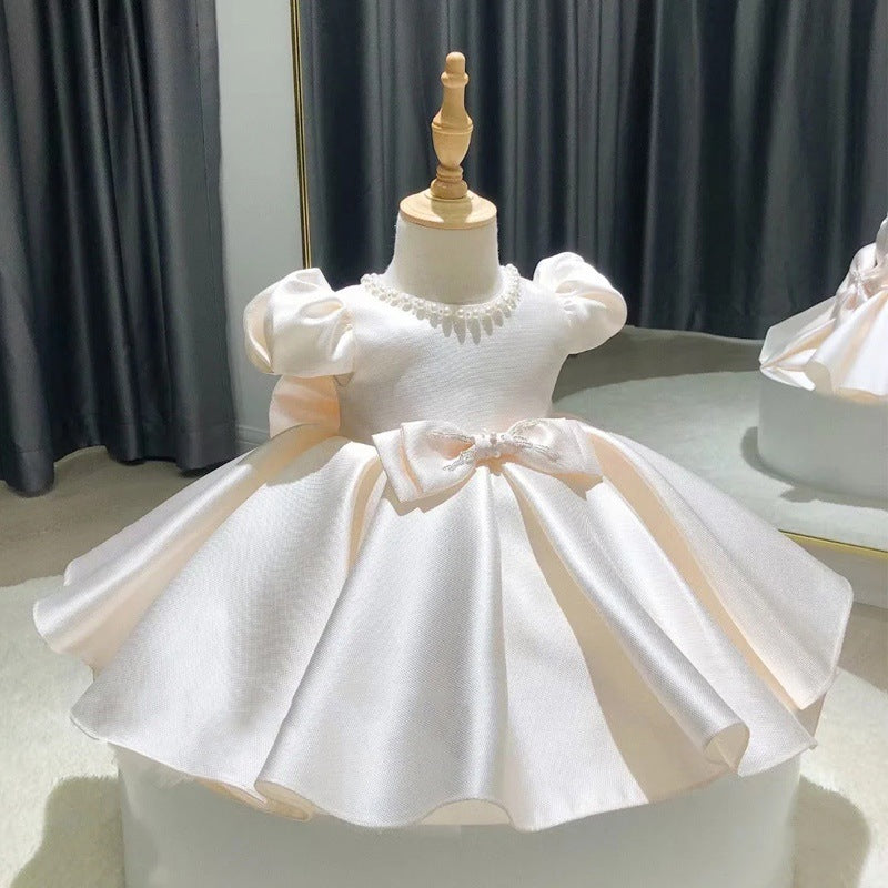 Abito cerimonia bambina  Bianco perla con fiocco e dettagli in perle